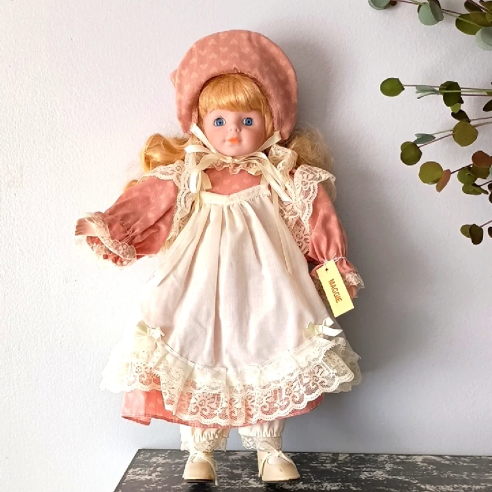 Vintage Porcelain Doll with Pink Dress and Bonnet by Dynasty Dolls